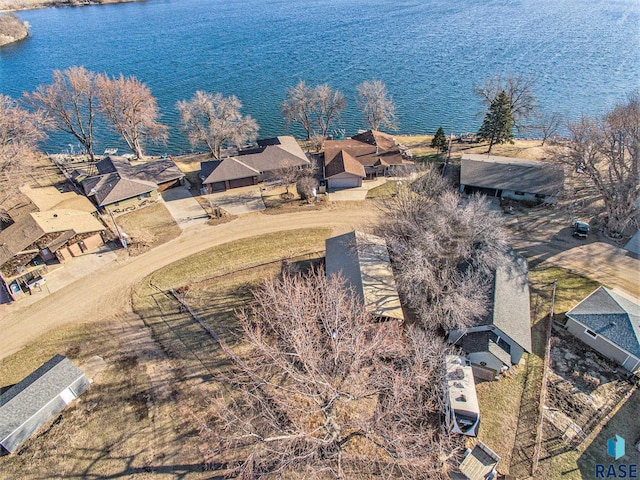bird's eye view featuring a residential view and a water view