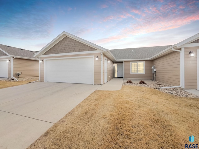 6309 W Maxwell Pl, Sioux Falls, SD 57107 - ranch-style house featuring driveway, an attached garage, and roof with shingles