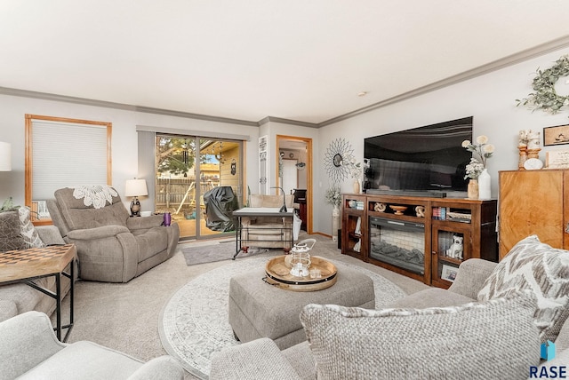 living room featuring carpet floors and ornamental molding