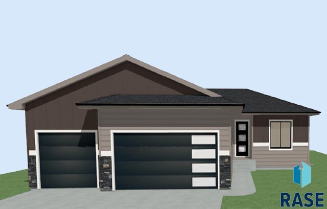 1320 Poplar Ave, Tea, SD 57064 - view of front of house with an attached garage, driveway, and stone siding