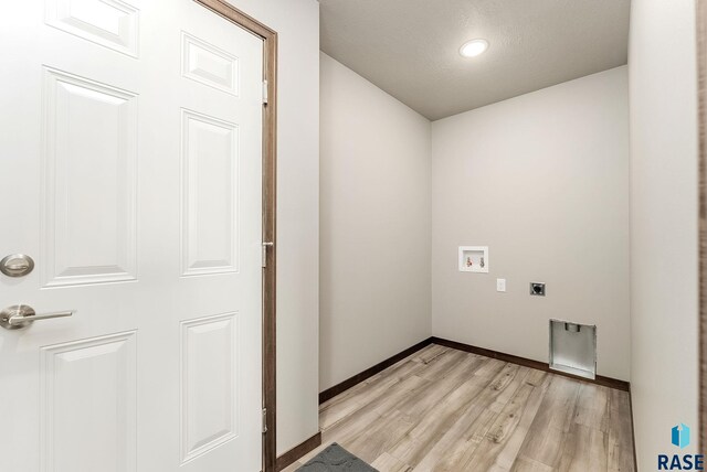 1320 Poplar Ave, Tea, SD 57064 - washroom with baseboards, laundry area, light wood-style flooring, electric dryer hookup, and hookup for a washing machine
