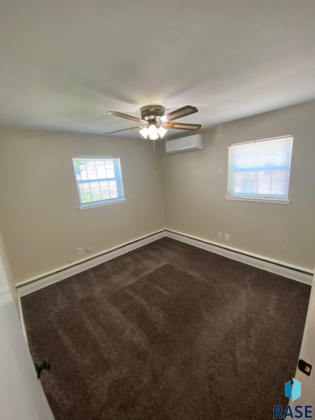 3016 E 20th St, Sioux Falls, SD 57103 - unfurnished room with dark colored carpet, an AC wall unit, and a ceiling fan