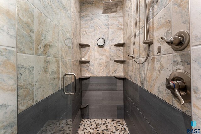 bathroom with a shower stall