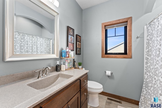 full bathroom with visible vents, baseboards, toilet, vanity, and wood finished floors