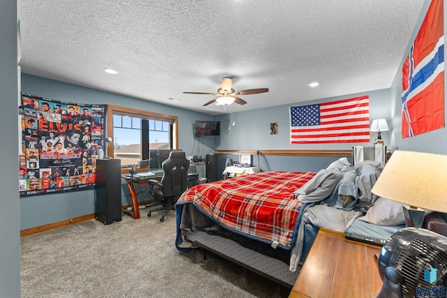 carpeted bedroom with baseboards, recessed lighting, ceiling fan, and a textured ceiling