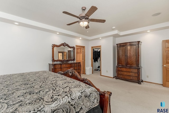 7 N Sun Valley Pl, Sioux Falls, SD 57110 - bedroom with a raised ceiling, light colored carpet, baseboards, and a ceiling fan