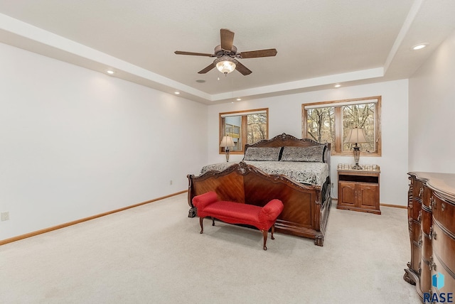 7 N Sun Valley Pl, Sioux Falls, SD 57110 - bedroom featuring light carpet, a tray ceiling, and baseboards