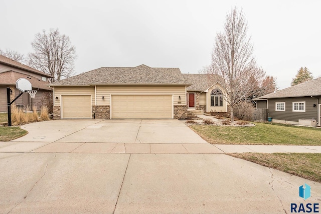 view of front of property with driveway, a front lawn, brick siding, a garage, and a shingled roof