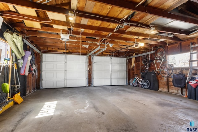 garage featuring a garage door opener