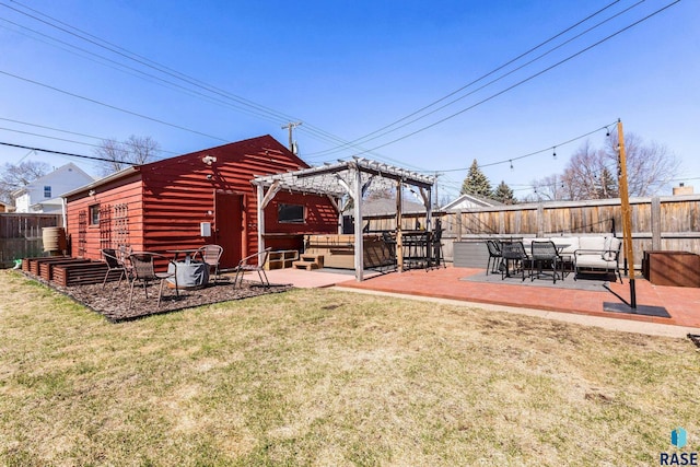 view of yard featuring a fenced backyard, outdoor lounge area, a patio, and a pergola