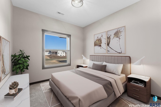 bedroom featuring carpet, visible vents, and baseboards