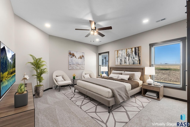 bedroom featuring a ceiling fan, visible vents, recessed lighting, carpet floors, and baseboards
