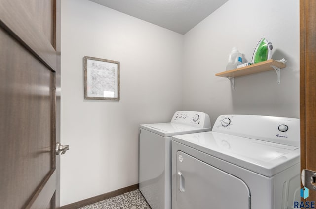 laundry room featuring independent washer and dryer, laundry area, and baseboards