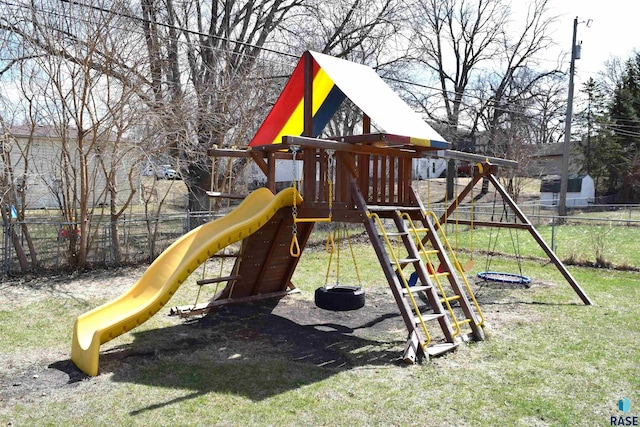 view of playground featuring fence