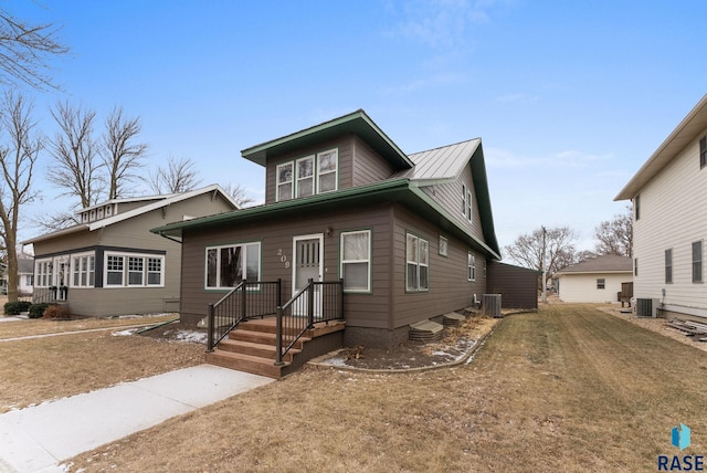 209 S 3rd St, Beresford, SD 57004 - view of front of property featuring central AC unit