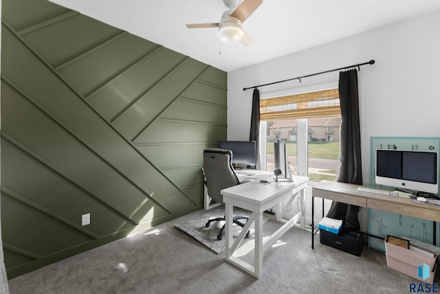 carpeted office with ceiling fan