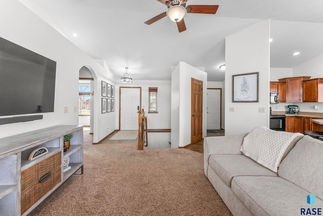 living area with recessed lighting, vaulted ceiling, a ceiling fan, and carpet floors
