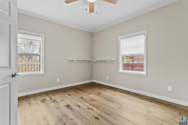 1205 Douglas Ave, Yankton, SD 57078 - empty room with baseboards, a ceiling fan, and hardwood / wood-style floors