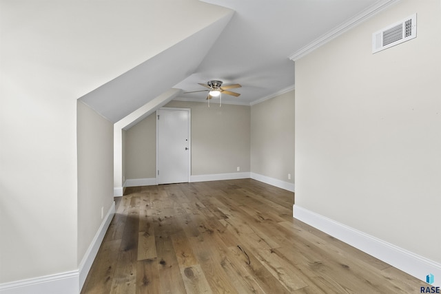 1205 Douglas Ave, Yankton, SD 57078 - bonus room featuring ceiling fan, visible vents, wood finished floors, lofted ceiling, and baseboards