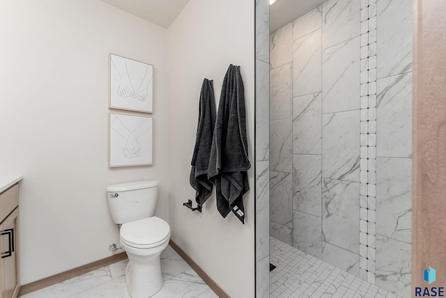 5709 S Spirea Ave, Sioux Falls, SD 57106 - full bath featuring a walk in shower, vanity, toilet, marble finish floor, and baseboards