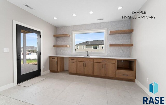 8312 E Wicker Ct, Sioux Falls, SD 57110 - kitchen with recessed lighting, visible vents, light countertops, and open shelves