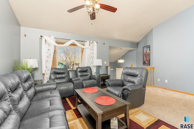 living room with light colored carpet, vaulted ceiling, and ceiling fan