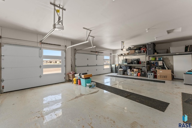 garage featuring a garage door opener