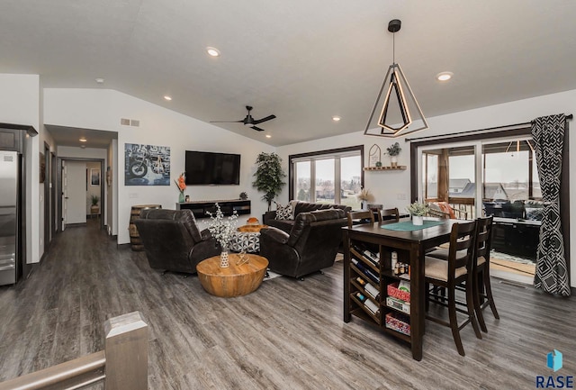 23744 461a Ave # 2, Wentworth, SD 57075 - dining space featuring dark wood-style flooring, visible vents, a ceiling fan, and vaulted ceiling