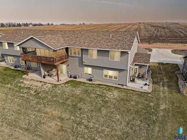 23744 461a Ave # 2, Wentworth, SD 57075 - back of property featuring a patio, a yard, and cooling unit