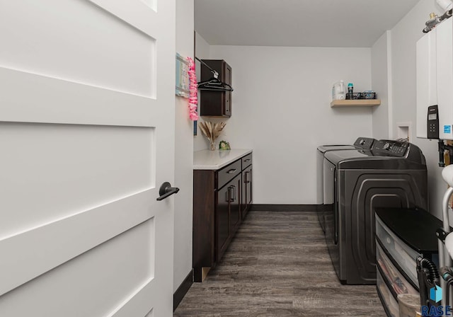 23744 461a Ave # 2, Wentworth, SD 57075 - laundry area with laundry area, dark wood-style floors, and washing machine and dryer