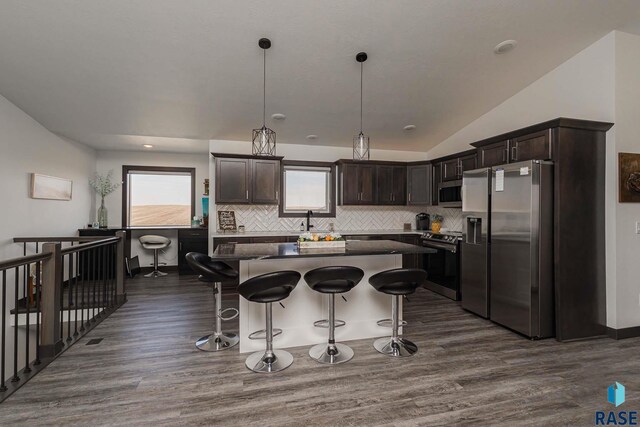 23744 461a Ave # 2, Wentworth, SD 57075 - kitchen featuring stainless steel appliances, dark brown cabinetry, dark wood-style floors, and dark countertops