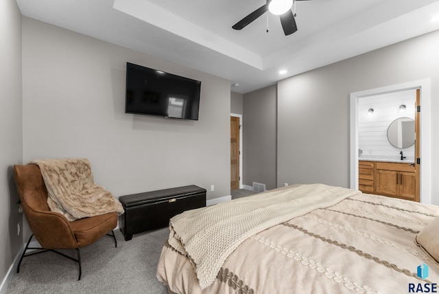 bedroom featuring ensuite bath, recessed lighting, carpet floors, a sink, and baseboards