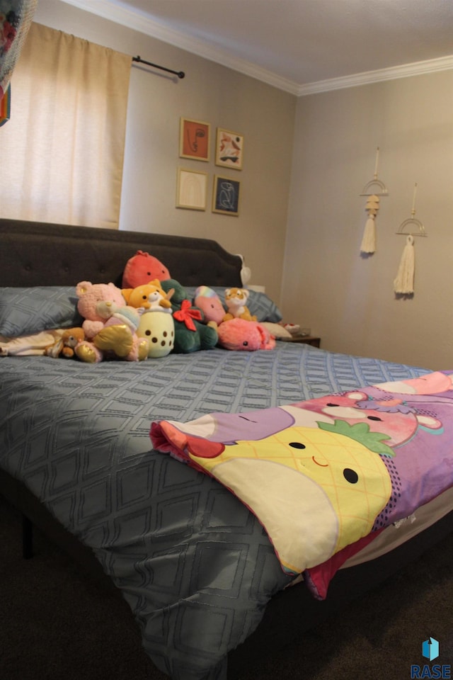 bedroom with crown molding