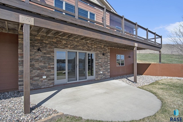 view of patio with a wooden deck