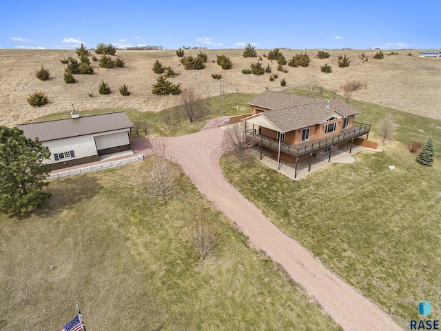 birds eye view of property featuring a rural view