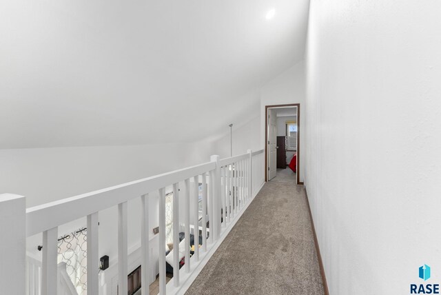 3325 E Manor Cir, Sioux Falls, SD 57103 - corridor featuring carpet and vaulted ceiling
