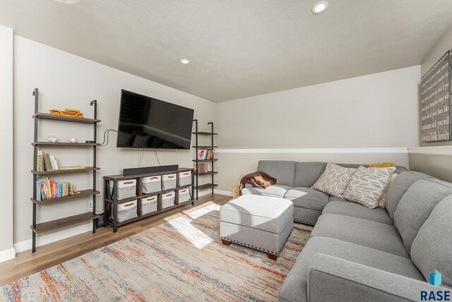 604 Eagle Ave, Harrisburg, SD 57032 - living area featuring recessed lighting, baseboards, and wood finished floors
