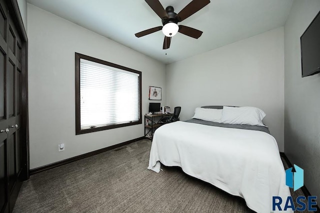 105 N Nora St, Viborg, SD 57070 - bedroom with carpet floors, baseboards, and a ceiling fan