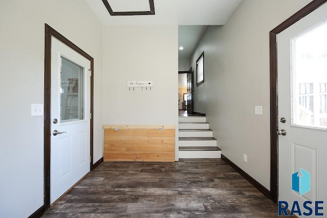 105 N Nora St, Viborg, SD 57070 - foyer entrance featuring dark wood-style flooring, stairway, recessed lighting, and a healthy amount of sunlight