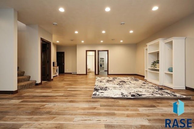 105 N Nora St, Viborg, SD 57070 - interior space with light wood finished floors, baseboards, stairs, and recessed lighting
