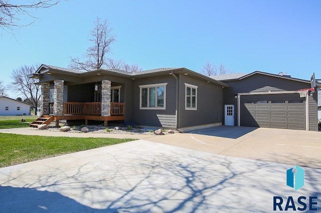 105 N Nora St, Viborg, SD 57070 - single story home featuring a garage and concrete driveway