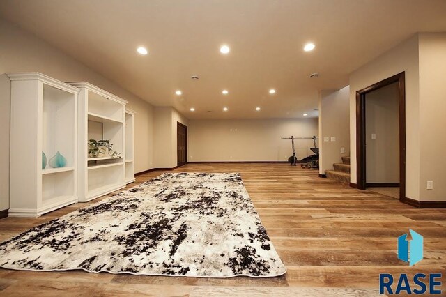 105 N Nora St, Viborg, SD 57070 - exercise room featuring light wood-type flooring, baseboards, and recessed lighting