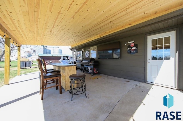 105 N Nora St, Viborg, SD 57070 - view of patio / terrace featuring a grill and outdoor dry bar