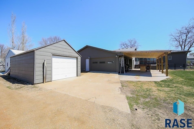 105 N Nora St, Viborg, SD 57070 - ranch-style home featuring a garage and concrete driveway