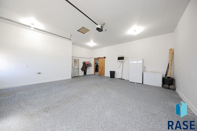 105 N Nora St, Viborg, SD 57070 - garage featuring baseboards, freestanding refrigerator, heating unit, and a garage door opener