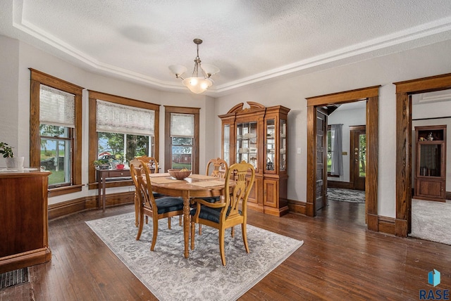 28128 462nd Ave, Davis, SD 57021 - dining area featuring dark wood-style flooring, visible vents, a notable chandelier, and a textured ceiling