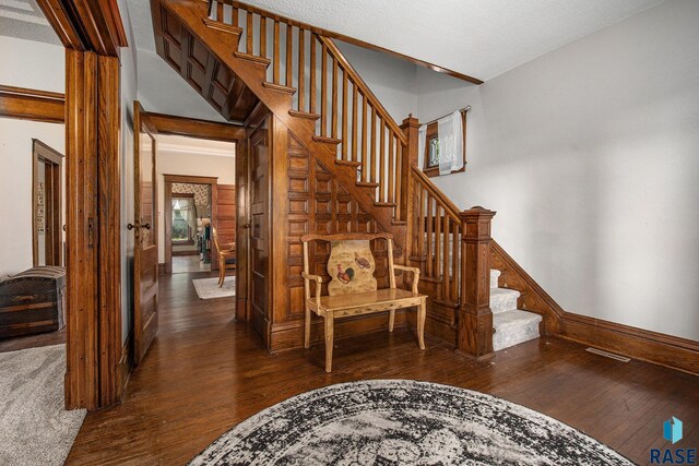 28128 462nd Ave, Davis, SD 57021 - stairs featuring hardwood / wood-style floors and baseboards
