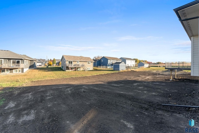 view of yard with a residential view