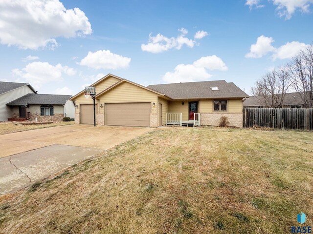 single story home featuring brick siding, a garage, and concrete driveway