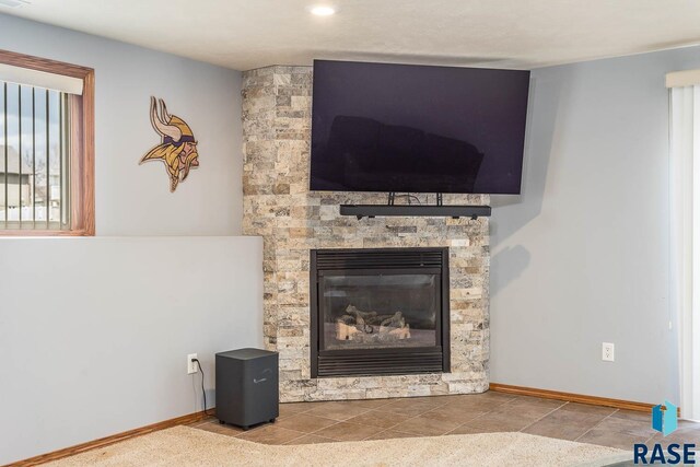 6520 S Heatherridge Trl, Sioux Falls, SD 57108 - room details with a stone fireplace, recessed lighting, and baseboards